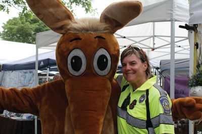 Harbor Days 
Harbor Days came to Mattapoisett this past weekend, and many visitors were gracious enough to spin The Wanderer Wheel for a $1 donation to the Lions Club. Those who played helped raise an extra $523 the Lions Club will use to benefit the community. The Aardvark came out too, but since furry aardvarks hate hot weather, he only made a couple of appearances. Photos by Jean Perry
