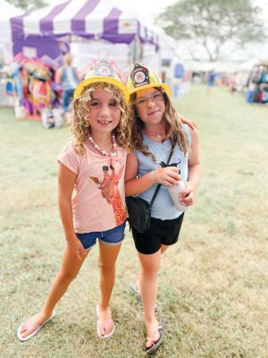 Harbor Days
Aja and Leia sporting their Mattapoisett Fire Department Junior Firefighter hats during Harbor Days this past weekend. Photo courtesy Kristen Boucher
