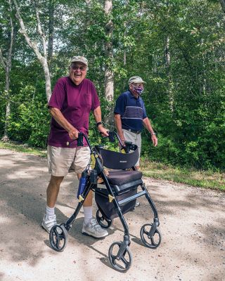 Long Walk
At age 88, Brad Hathaway is nearing the completion of his mission to walk the equivalent of the earth’s 24,901 mile circumference, and he is dedicating his effort to fundraising for the Mattapoisett Land Trust. Accompanying Mr. Hathaway on this September 3 walk in Mattapoisett is his good friend Carl Sharpe. See story. Photo by Ryan Feeney.
