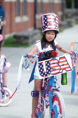 Heritage Days 2011
Children festooned their bicycles and enjoyed a ride around the village as a part of the 2011 Mattapoisett Heritage Days on August 6. Other Saturday activities included guided village tours, an evening concert and a treasure hunt. Mattapoisett bustled with activities on Saturday, but the bonfire was canceled due to wind, and many Heritage Days activities were canceled on Sunday due to heavy rain. Photos by Felix Perez.
