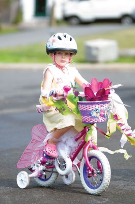 Heritage Days 2011
Children festooned their bicycles and enjoyed a ride around the village as a part of the 2011 Mattapoisett Heritage Days on August 6. Other Saturday activities included guided village tours, an evening concert and a treasure hunt. Mattapoisett bustled with activities on Saturday, but the bonfire was canceled due to wind, and many Heritage Days activities were canceled on Sunday due to heavy rain. Photos by Felix Perez.
