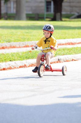 Heritage Days Bike Parade
Dozens of children gathered at the Center School to showcase their best bicycles and doll carriages in a parade for Heritage Days. Photo by Felix Perez. 
