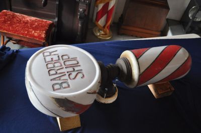 Mattapoisett History
One of the new artifacts accepted by the Mattapoisett Historical Society at their September 17, 2011 annual meeting was a barbershop poll from Richard Morgado. His father, Al Morgado, ran a barbershop on Church Street for about 30 years. Photo by Kyle DeCicco-Carey.
