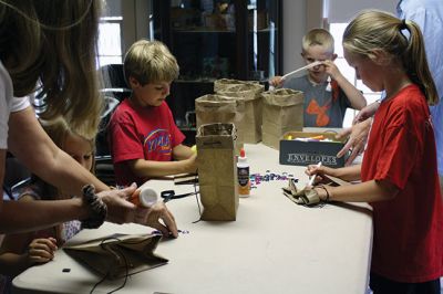 Mattapoisett Historical Society
Ever tried eating a salty piece of hard tack, made your own signal flags, or learned to tie nautical knots? Some pint-sized future sailors at the Mattapoisett Historical Society Museum learned about what it was like to be a sailor back in the whaling days, with a little bit of history sneaked into all the fun and games. Photos by Jean Perry
