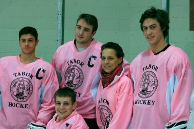 Pink in the Rink
Tabor Academy painted the rink pink on January 8, 2011, to promote awareness and raise money for cancer research. The event raised $6,760 in honor of cancer survivor Kim Grondin, who is the mother of hockey forward Kody Grondin. Photos by Laura Pedulli and Roberta Meads.
