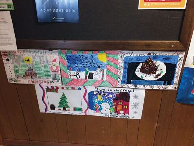 Christmas Posters 
Christmas posters created by RMS fifth graders hang on the walls of Town Hall, a tradition in Rochester year after year. The winner of the poster contest was Arianna Vinagre, who got to light the tree at the tree lighting ceremony. 
