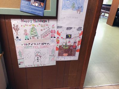 Christmas Posters 
Christmas posters created by RMS fifth graders hang on the walls of Town Hall, a tradition in Rochester year after year. The winner of the poster contest was Arianna Vinagre, who got to light the tree at the tree lighting ceremony. 
