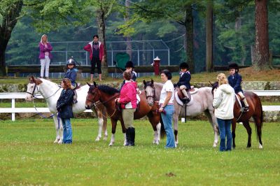 Marion Horse Show
On Wednesday, July 4, 2012, Tri-Town residents were invited to the 65th annual Marion Horse Show, an exhibition that features riders of all classes and age levels from around the region.  The friendly competition was held at Washburn Park, despite the rain, and saw about 50 entrants participating in 13 divisions.  Photo by Eric Tripoli. 
