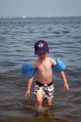 Beach Fun
Tri-Town beaches were packed with residents looking to escape the heat during record high temperatures on July 22, 2011. According to individual reports, the mercury hit 103 in Mattapoisett mid-day. The Mattapoisett COA and library saw a slight influx of people seeking air conditioning as well. Photos by Felix Perez.
