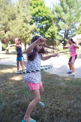 Hula Hooping
On Saturday, July 23, kids at the Plumb Library in Rochester tried a little hula hooping with Pinto Bella. The event is part of the library’s summer reading theme of health and wellness. Photos by Colin Veitch
