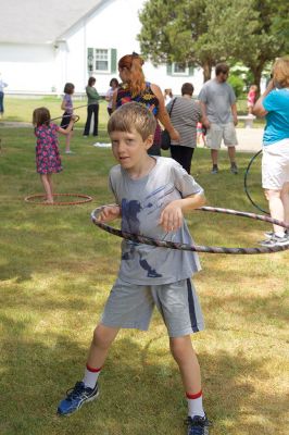 Hula-hoop Performer
Hula-hoop performer Pinto Bella taught kids the benefit of hula-hooping for body and mind and performed superhero-themed tricks on June 20 at Plumb Library. Photos by Colin Veitch
