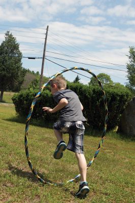 Hula-hoop Performer
Hula-hoop performer Pinto Bella taught kids the benefit of hula-hooping for body and mind and performed superhero-themed tricks on June 20 at Plumb Library. Photos by Colin Veitch
