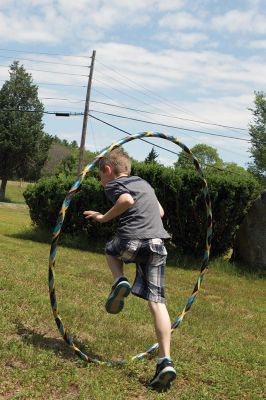 Hula-hoop Performer
Hula-hoop performer Pinto Bella taught kids the benefit of hula-hooping for body and mind and performed superhero-themed tricks on June 20 at Plumb Library. Photos by Colin Veitch
