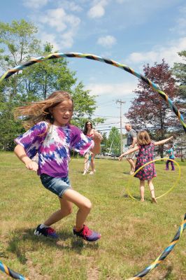 Hula-hoop Performer
Hula-hoop performer Pinto Bella taught kids the benefit of hula-hooping for body and mind and performed superhero-themed tricks on June 20 at Plumb Library. Photos by Colin Veitch
