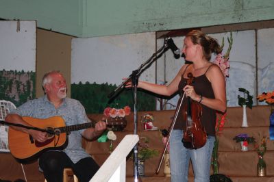 Grange Fiddler
Tiffany Rozenas, a Celtic Fiddler from Rochester and her father, Bronie Rozenas, who plays guitar, at the Rochester Grange Fair this past Saturday, August 15, 2009. (photo by Sarak K. Taylor)
