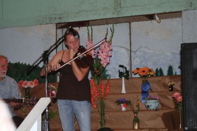 Grange Fiddler
Tiffany Rozenas, a Celtic Fiddler from Rochester and her father, Bronie Rozenas, who plays guitar, at the Rochester Grange Fair this past Saturday, August 15, 2009. (photo by Sarak K. Taylor)
