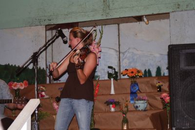 Grange Fiddler
Tiffany Rozenas, a Celtic Fiddler from Rochester and her father, Bronie Rozenas, who plays guitar, at the Rochester Grange Fair this past Saturday, August 15, 2009. (photo by Sarak K. Taylor)
