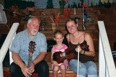 Grange Fiddler
Tiffany Rozenas, a Celtic Fiddler from Rochester and her father, Bronie Rozenas, who plays guitar, at the Rochester Grange Fair this past Saturday, August 15, 2009. (photo by Sarak K. Taylor)

