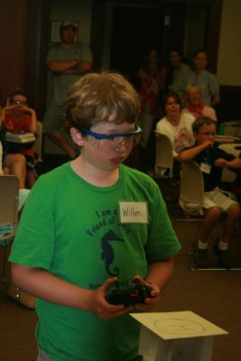 Extreme Engineering
On Tuesday, July 31, dozens of curious students gathered at the Mattapoisett Library to join Dr. Martin Hudis in his Extreme Engineering program.  The students participated in a variety of different exercises using remote controlled helicopters in a hands-on approach to learn valuable lessons in math and science.  The session was the last of four conducted by Dr. Hudis.  Photo by Katy Fitzpatrick.
