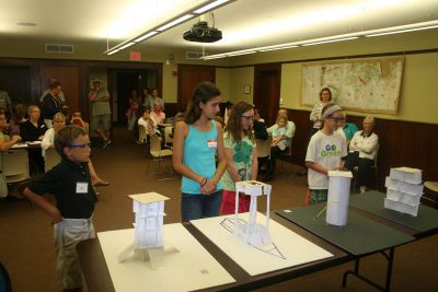 Extreme Engineering
On Tuesday, July 31, dozens of curious students gathered at the Mattapoisett Library to join Dr. Martin Hudis in his Extreme Engineering program.  The students participated in a variety of different exercises using remote controlled helicopters in a hands-on approach to learn valuable lessons in math and science.  The session was the last of four conducted by Dr. Hudis.  Photo by Katy Fitzpatrick.
