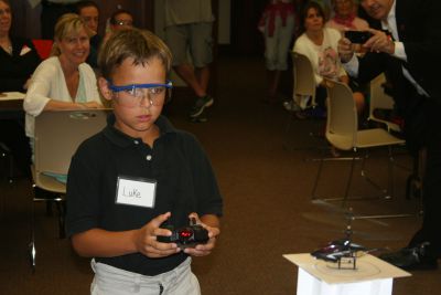 Extreme Engineering
On Tuesday, July 31, dozens of curious students gathered at the Mattapoisett Library to join Dr. Martin Hudis in his Extreme Engineering program.  The students participated in a variety of different exercises using remote controlled helicopters in a hands-on approach to learn valuable lessons in math and science.  The session was the last of four conducted by Dr. Hudis.  Photo by Katy Fitzpatrick.
