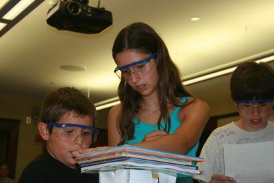 Extreme Engineering
On Tuesday, July 31, dozens of curious students gathered at the Mattapoisett Library to join Dr. Martin Hudis in his Extreme Engineering program.  The students participated in a variety of different exercises using remote controlled helicopters in a hands-on approach to learn valuable lessons in math and science.  The session was the last of four conducted by Dr. Hudis.  Photo by Katy Fitzpatrick.
