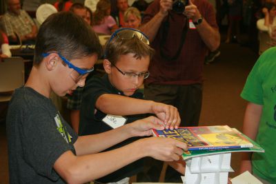 Extreme Engineering
On Tuesday, July 31, dozens of curious students gathered at the Mattapoisett Library to join Dr. Martin Hudis in his Extreme Engineering program.  The students participated in a variety of different exercises using remote controlled helicopters in a hands-on approach to learn valuable lessons in math and science.  The session was the last of four conducted by Dr. Hudis.  Photo by Katy Fitzpatrick.
