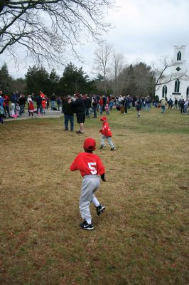 Opening Day
The Rochester Youth Baseball League held their annual opening day ceremony and parade on Saturday, April 11. About 400 people, including players, coaches and their families, participated in the procession that made its way down Route 105 to Gifford Parks Al Herbert Memorial Field for the opening day festivies. Photo by Robert Chiarito.
