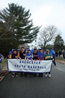 Opening Day
The Rochester Youth Baseball League held their annual opening day ceremony and parade on Saturday, April 11. About 400 people, including players, coaches and their families, participated in the procession that made its way down Route 105 to Gifford Parks Al Herbert Memorial Field for the opening day festivies. Photo by Robert Chiarito.
