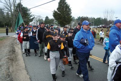 Opening Day
The Rochester Youth Baseball League held their annual opening day ceremony and parade on Saturday, April 11. About 400 people, including players, coaches and their families, participated in the procession that made its way down Route 105 to Gifford Parks Al Herbert Memorial Field for the opening day festivies. Photo by Robert Chiarito.
