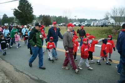 Opening Day
The Rochester Youth Baseball League held their annual opening day ceremony and parade on Saturday, April 11. About 400 people, including players, coaches and their families, participated in the procession that made its way down Route 105 to Gifford Parks Al Herbert Memorial Field for the opening day festivies. Photo by Robert Chiarito.
