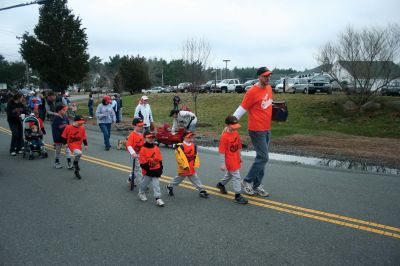 Opening Day
The Rochester Youth Baseball League held their annual opening day ceremony and parade on Saturday, April 11. About 400 people, including players, coaches and their families, participated in the procession that made its way down Route 105 to Gifford Parks Al Herbert Memorial Field for the opening day festivies. Photo by Robert Chiarito.
