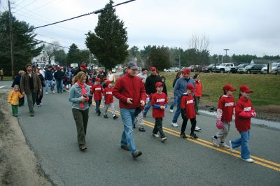 Opening Day
The Rochester Youth Baseball League held their annual opening day ceremony and parade on Saturday, April 11. About 400 people, including players, coaches and their families, participated in the procession that made its way down Route 105 to Gifford Parks Al Herbert Memorial Field for the opening day festivies. Photo by Robert Chiarito.
