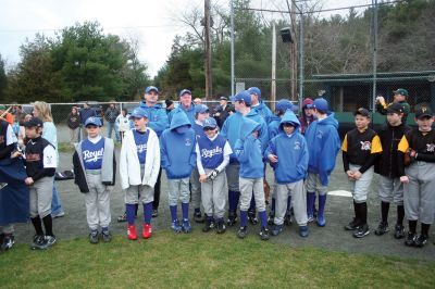 Opening Day
The Rochester Youth Baseball League held their annual opening day ceremony and parade on Saturday, April 11. About 400 people, including players, coaches and their families, participated in the procession that made its way down Route 105 to Gifford Parks Al Herbert Memorial Field for the opening day festivies. Photo by Robert Chiarito.
