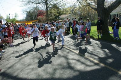 Mom's Run
Several hundred runners and walkers participated in the Tiara Classic Mother's Day 5k Race on Sunday morning, May 10 in Mattapoisett. The event, now in its third year raises funds and awareness for the Womens Fund of Southeastern Massachusetts while celebrating motherhood. Photo by Robert Chiarito.
