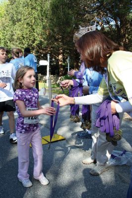 Mom's Run
Several hundred runners and walkers participated in the Tiara Classic Mother's Day 5k Race on Sunday morning, May 10 in Mattapoisett. The event, now in its third year raises funds and awareness for the Womens Fund of Southeastern Massachusetts while celebrating motherhood. Photo by Robert Chiarito.
