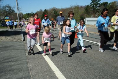 Mom's Run
Several hundred runners and walkers participated in the Tiara Classic Mother's Day 5k Race on Sunday morning, May 10 in Mattapoisett. The event, now in its third year raises funds and awareness for the Womens Fund of Southeastern Massachusetts while celebrating motherhood. Photo by Robert Chiarito.
