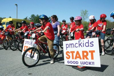 Bikes, Bikes, Bikes!
The Third Annual Pan Mass Challenge Kids Tri-Town Ride attracted several hundred young bicyclist to the ORR campus on Saturday morning, May 16, for a bike rally to help defeat cancer. Proceeds from the event will go to several charities in the state such as the Jimmy Fund and Dana- Farber Cancer Institute to assist in cancer research. The rally was expected to raise more than $15,000. Photo by Robert Chiarito.
