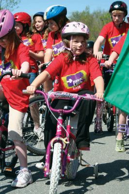 Bikes, Bikes, Bikes!
The Third Annual Pan Mass Challenge Kids Tri-Town Ride attracted several hundred young bicyclist to the ORR campus on Saturday morning, May 16, for a bike rally to help defeat cancer. Proceeds from the event will go to several charities in the state such as the Jimmy Fund and Dana- Farber Cancer Institute to assist in cancer research. The rally was expected to raise more than $15,000. Photo by Robert Chiarito.
