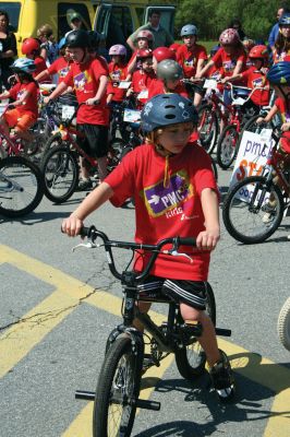 Bikes, Bikes, Bikes!
The Third Annual Pan Mass Challenge Kids Tri-Town Ride attracted several hundred young bicyclist to the ORR campus on Saturday morning, May 16, for a bike rally to help defeat cancer. Proceeds from the event will go to several charities in the state such as the Jimmy Fund and Dana- Farber Cancer Institute to assist in cancer research. The rally was expected to raise more than $15,000. Photo by Robert Chiarito.
