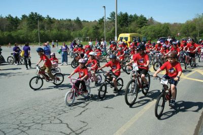 Bikes, Bikes, Bikes!
The Third Annual Pan Mass Challenge Kids Tri-Town Ride attracted several hundred young bicyclist to the ORR campus on Saturday morning, May 16, for a bike rally to help defeat cancer. Proceeds from the event will go to several charities in the state such as the Jimmy Fund and Dana- Farber Cancer Institute to assist in cancer research. The rally was expected to raise more than $15,000. Photo by Robert Chiarito.
