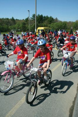 Bikes, Bikes, Bikes!
The Third Annual Pan Mass Challenge Kids Tri-Town Ride attracted several hundred young bicyclist to the ORR campus on Saturday morning, May 16, for a bike rally to help defeat cancer. Proceeds from the event will go to several charities in the state such as the Jimmy Fund and Dana- Farber Cancer Institute to assist in cancer research. The rally was expected to raise more than $15,000. Photo by Robert Chiarito.
