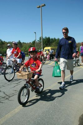 Bikes, Bikes, Bikes!
The Third Annual Pan Mass Challenge Kids Tri-Town Ride attracted several hundred young bicyclist to the ORR campus on Saturday morning, May 16, for a bike rally to help defeat cancer. Proceeds from the event will go to several charities in the state such as the Jimmy Fund and Dana- Farber Cancer Institute to assist in cancer research. The rally was expected to raise more than $15,000. Photo by Robert Chiarito.
