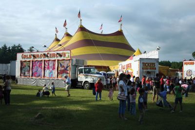 Circus Time
The Cole Brothers Circus made its annual visit to Rochester's Plumb Corner on Wednesday, June 24 and Thursday, June 25. The Circus, which featured highflying aerial acts, animal acts and plenty of clowns played four shows under the big top during its two-day stay. Proceeds from the circus will help to fund children's events throughout the year at Plumb Corner such as the Annual Easter egg hunt and the Halloween party. Photo by Robert Chiarito
