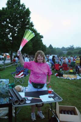 Celebrating the 4th
Marion's annual fireworks display attracted several thousand people to the town's Silvershell Beach Park on Friday evening July, 3. The Marion town band entertained the crowd until dusk when the night's big show lit up the sky's above Sippican Harbor. The Marion Fireworks Committee raised all of the funds for the event through private donations, collected up through the night of the show. Photo by Robert Chiarito.
