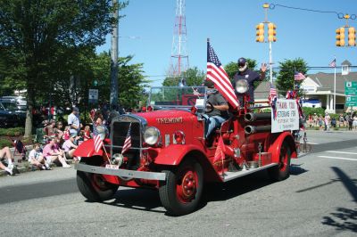 4th of July Parade
The Sun finally broke through the clouds to help make for a glorious Tri-Town Fourth of July weekend highlighted by Marion's annual Independence Day Parade, hosted by the Benjamin D. Cushing Post 2425 Veterans of Foreign Wars. Parade goers lined the streets of Marion Village as floats, antique vehicles, bands, and emergency vehicles made their way along the parade route this past Saturday morning. Photo by Robert Chiarito.
