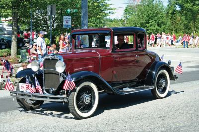 4th of July Parade
The Sun finally broke through the clouds to help make for a glorious Tri-Town Fourth of July weekend highlighted by Marion's annual Independence Day Parade, hosted by the Benjamin D. Cushing Post 2425 Veterans of Foreign Wars. Parade goers lined the streets of Marion Village as floats, antique vehicles, bands, and emergency vehicles made their way along the parade route this past Saturday morning. Photo by Robert Chiarito.
