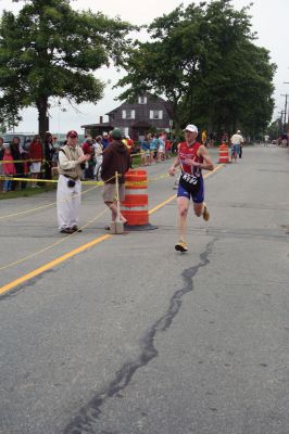 Triathlon 2009
Over two hundred athletes participated in this year's Mattapoisett Triathlon on Sunday morning, July 12. The athletes endurance was tested over a course which included a quarter-mile swim, a ten-mile bike ride and a three and three quarters-mile run. The race marks the beginning of the Mattapoisett Lions Club's annual Harbor Days Celebration with events including a craft fair, several suppers and a pancake breakfast , which unfold over the course of the week. Photo by Robert Chiarito.
