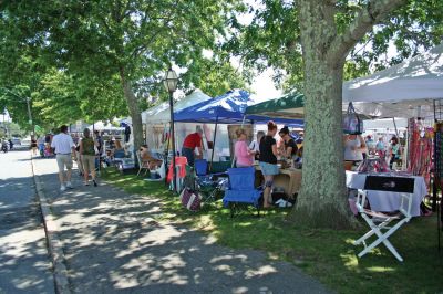 Harbor Days
The Mattapoisett Lions Club's Harbor Days Celebration 2009 wrapped up on Sunday, July 19 after a week of dining adventures, live entertainment and craft fair fun. Thousands of visitors flocked to the Mattapoisett waterfront for this annual event now in its twenty sixth year. Proceeds from the celebration help to fund many of the Club's charitable endeavors, including the Massachusetts Lions Eye Research Fund. Photo by Robert Chiarito
