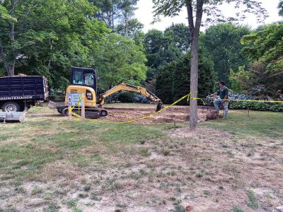 Elizabeth Taber Statue
On July 14, work began on the Elizabeth Taber Statue site at Bicentennial Park in Marion. The site will include granite steppers, concrete paving, lighting, two wooden benches and a granite bench for Elizabeth to sit on. There will be room on either side of the granite bench for folks to sit and thank Elizabeth for all that she did for Marion. Susannah Davis of Marion has designed the plantings that will be added around the site. – Judith Rosbe
